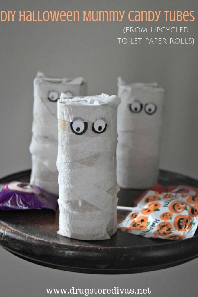 These DIY Halloween Mummy Candy Tubes are the perfect treat for trick or treaters. Find out how to make them from upcycled toilet paper rolls on www.drugstoredivas.net.