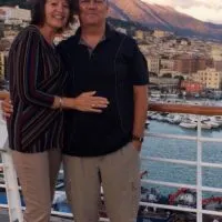 A couple on a cruise with the words 