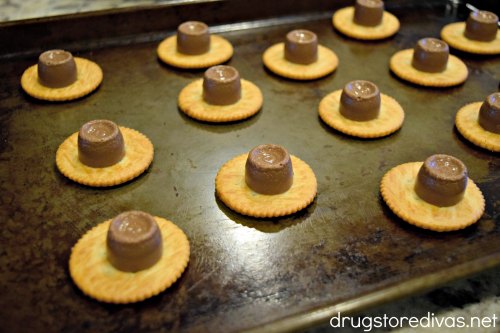 Chocolate-Dipped Rolo Stuffed Ritz Crackers is the perfect easy dessert. It takes under 10 minutes! Get the recipe at www.drugstoredivas.net.