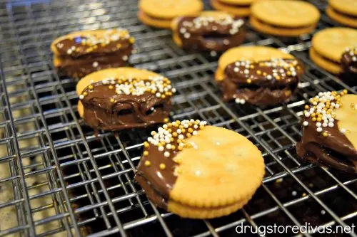 Chocolate-Dipped Rolo Stuffed Ritz Crackers is the perfect easy dessert. It takes under 10 minutes! Get the recipe at www.drugstoredivas.net.