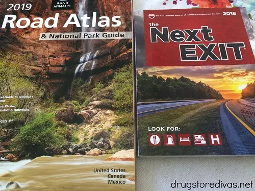 A road atlas and the Next Exit book.