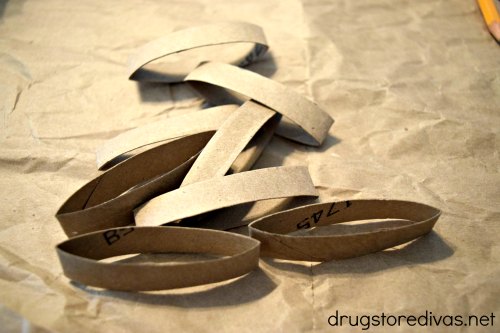 This DIY Valentine's Day Toilet Paper Roll Wreath is the perfect upcycle craft. Find out how to make it at www.drugstoredivas.net.