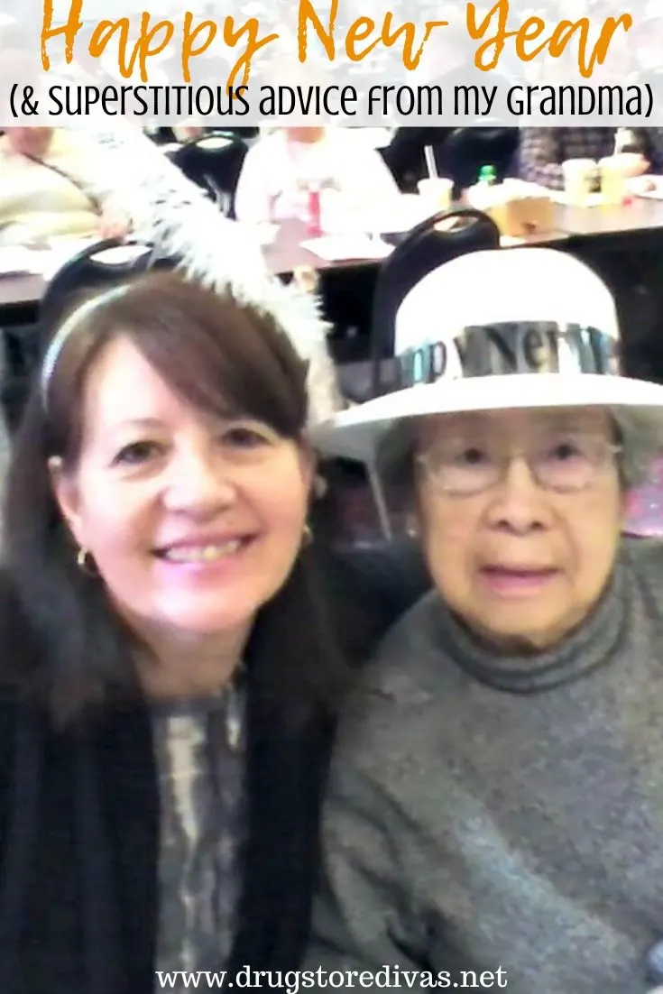 Two women with Happy New Year hats and the words 