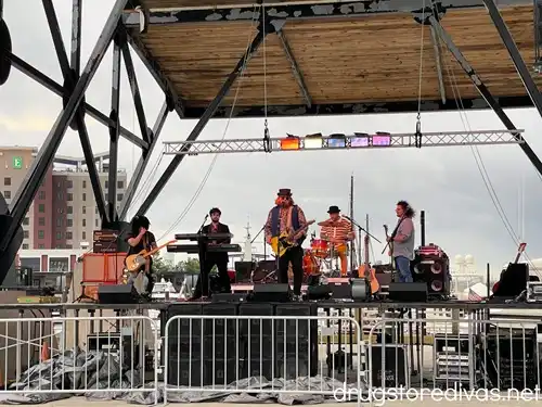 A Tom Petty cover band on stage overlooking the water at Marina Grill in Wilmington, NC.