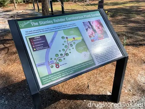 A sign with a map at the entrance of the Stanley Rehder Carnivorous Plant Garden in Wilmington, NC.