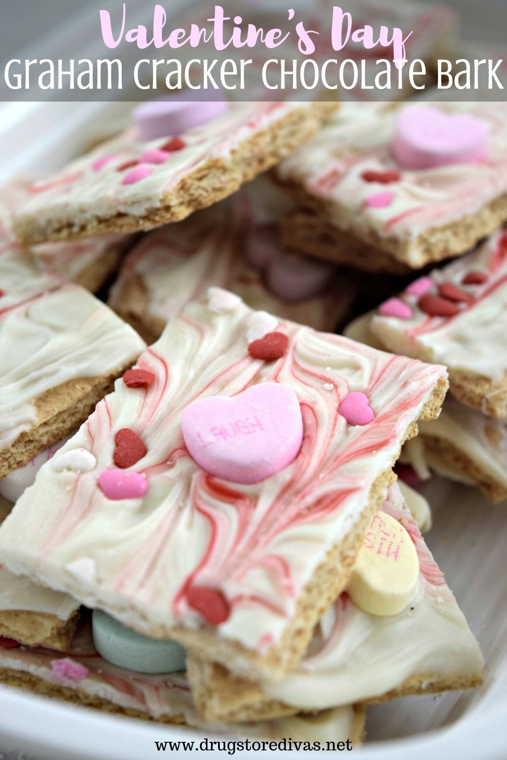 Pieces of Valentine's Day cracker bark with the words "Valentine's Day Graham Cracker Chocolate Bark " digitally written on top.