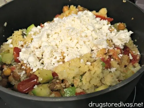 This Vegetarian Couscous is packed with zucchini, eggplant, tomatoes, and chickpeas. You won't even miss the meat. Get the recipe at www.drugstoredivas.net.