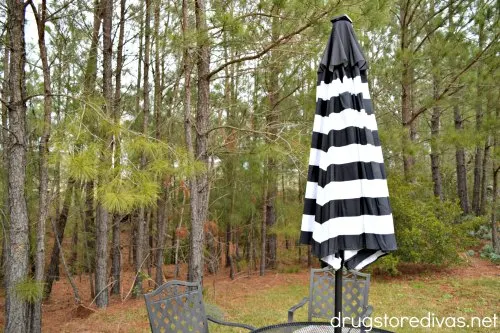 An outdoor patio set and umbrella.