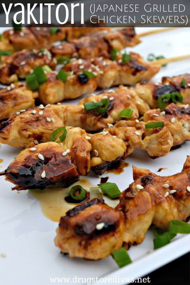 Five grilled chicken skewers with the words "Yakitori (Japanese Grilled Chicken Skewers)" digitally written on top.