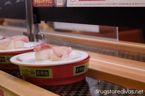 Plates of sushi on a conveyor belt at Sushiro in Japan.