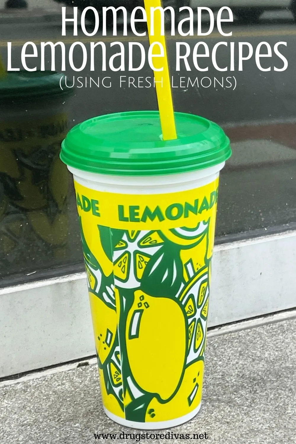 A green, yellow, and white plastic cup with the word lemonade on it with a green top and yellow straw and the words 