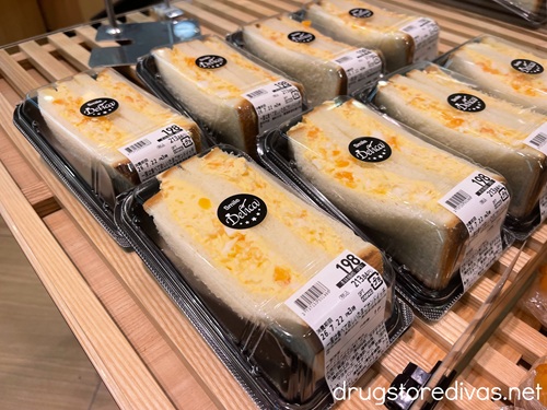 A shelf full of Japanese egg sandwiches.