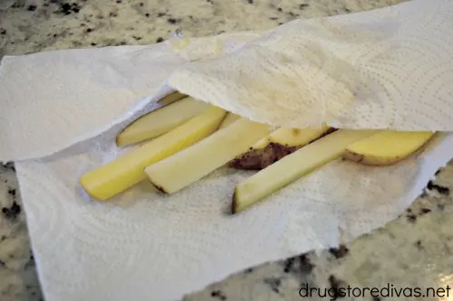 Grilled French Fries are the perfect side dish for burgers. And even better, you don't have to turn on the oven to make them. Find out how to grill French fries on www.drugstoredivas.net.