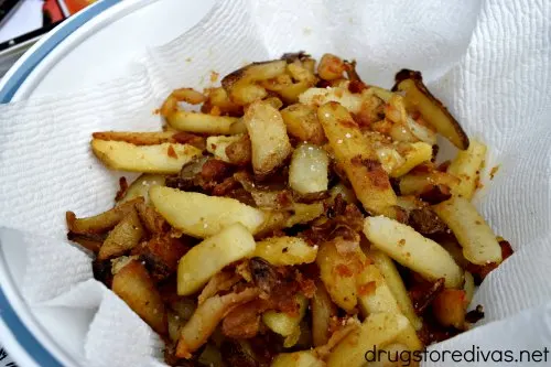 Grilled French Fries are the perfect side dish for burgers. And even better, you don't have to turn on the oven to make them. Find out how to grill French fries on www.drugstoredivas.net.