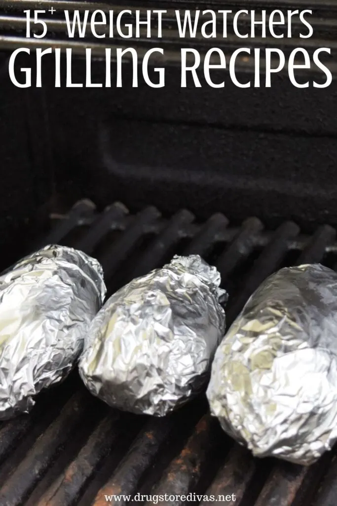 Potatoes wrapped in foil on a grill with the words "15+ Weight Watchers Grilling Recipes" digitally written on top.