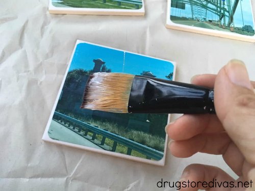 Homemade Photo Coasters are a great personalized souvenir after a trip. Find out how to make them at www.drugstoredivas.net.