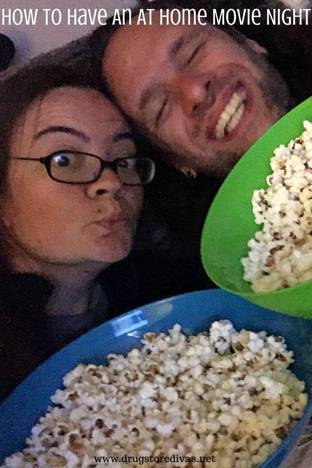 A man and a woman, holding popcorn, with the words 