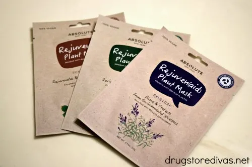 Three face masks in packages.