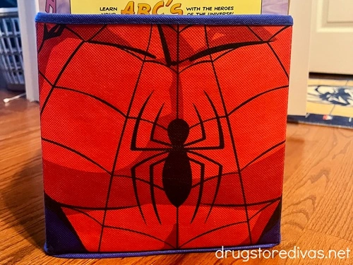 A Spiderman book storage bin.
