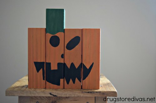DIY Mix and Match Wooden Pumpkin Face Decoration.