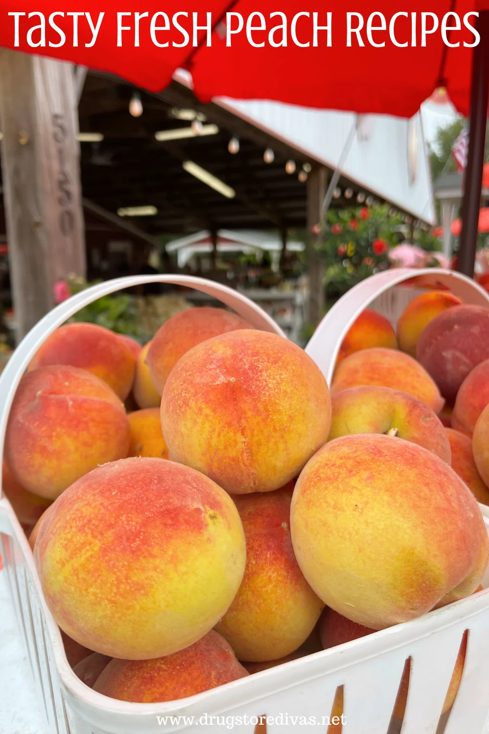 Two white baskets of peaches with the words 