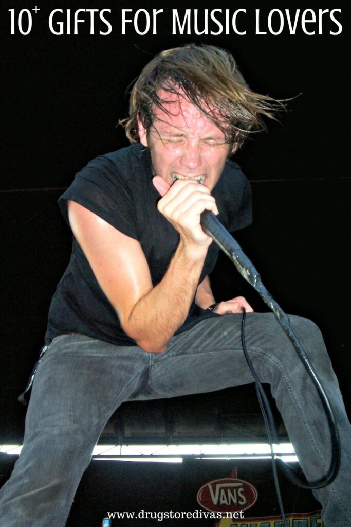 A man singing on stage into a microphone with the words "10+ Gifts For Music Lovers" digitally written above him.