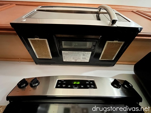 The underside of the oven, showing the oven range hood.