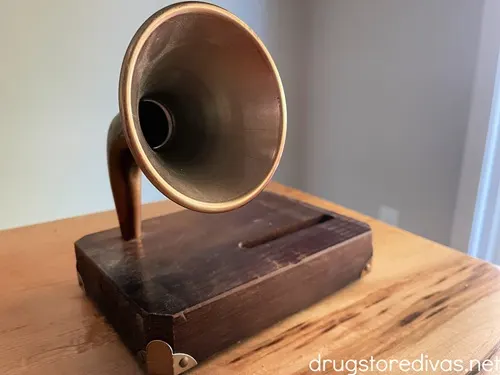 A vintage gramophone-shaped speaker on a table.