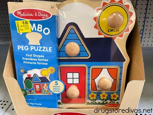 A Melissa & Doug jumbo peg puzzle on a shelf.