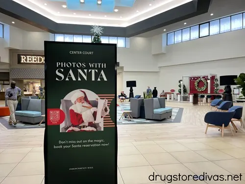 A sign advertising photos with Santa at the Independence Mall in Wilmington, NC.