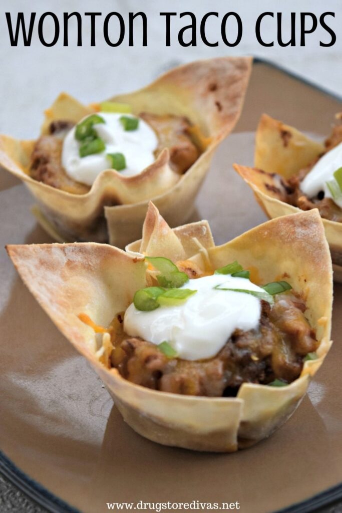 Wonton Taco Cups on a brown plate.