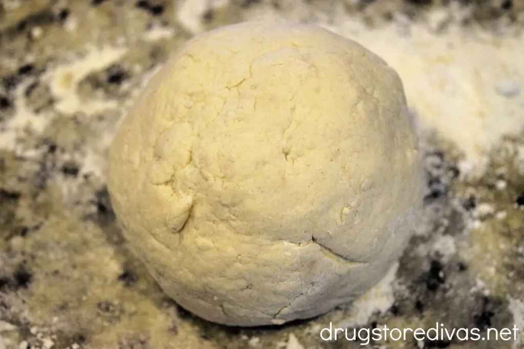 It's so easy to make these delicious 2 Ingredient Dough Cinnamon Rolls. Find out how on www.drugstoredivas.net.