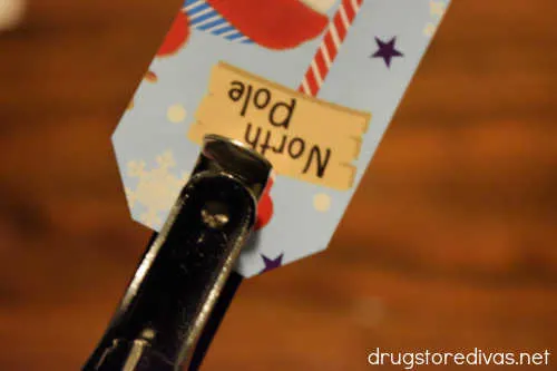 Don't toss those old Christmas cards. Instead, turn them into gift tags for next year. Find out how on www.drugstoredivas.net.