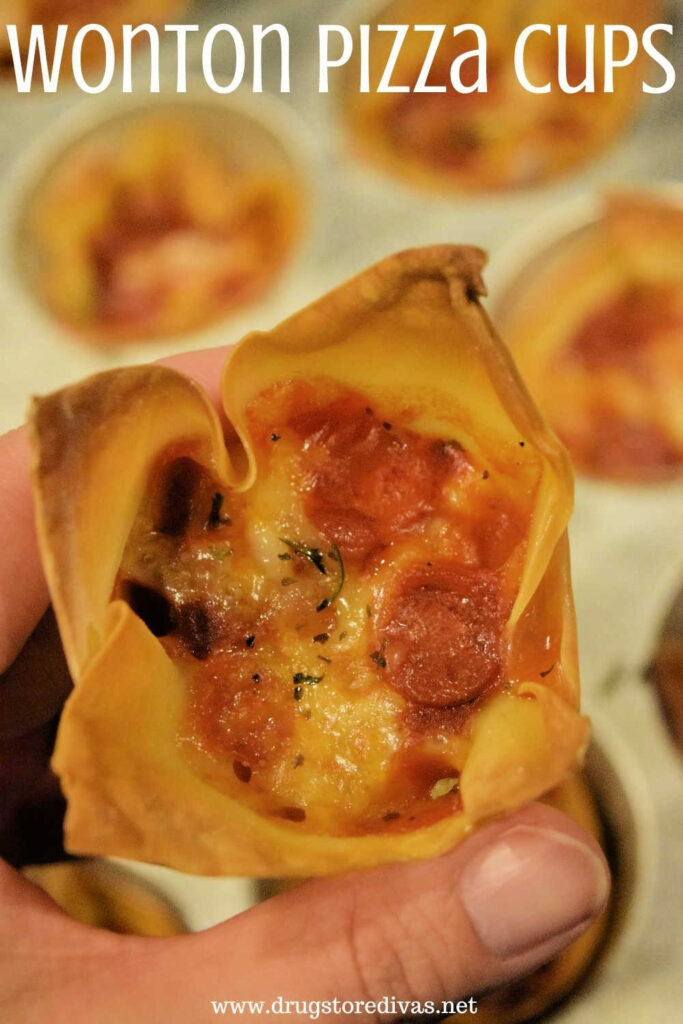 Wonton Pizza Cups in a woman's hand.