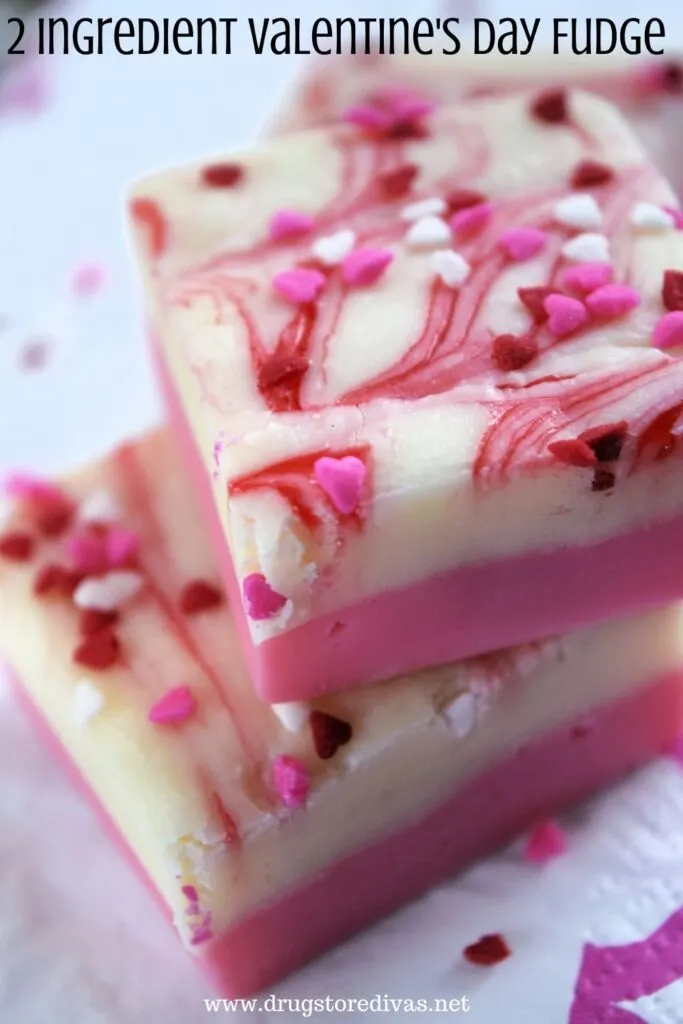 Two pieces of pink and white and pink fudge with the words "2 Ingredient Valentine's Day Fudge" digitally written on top.