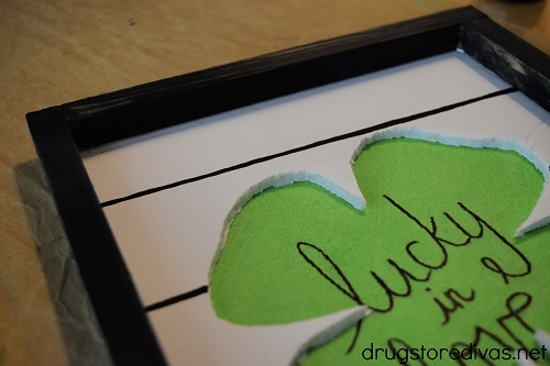 This DIY "Lucky In Love" Shamrock Shiplap Sign is a fun St. Patrick's Day craft. It should cost you about $2 to make if you have the paint already.