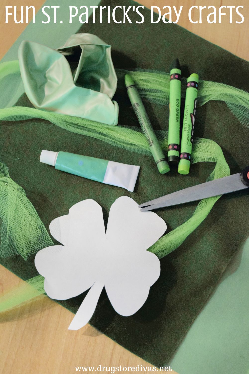 Green craft items, with a white shamrock cut out on top, with the words 