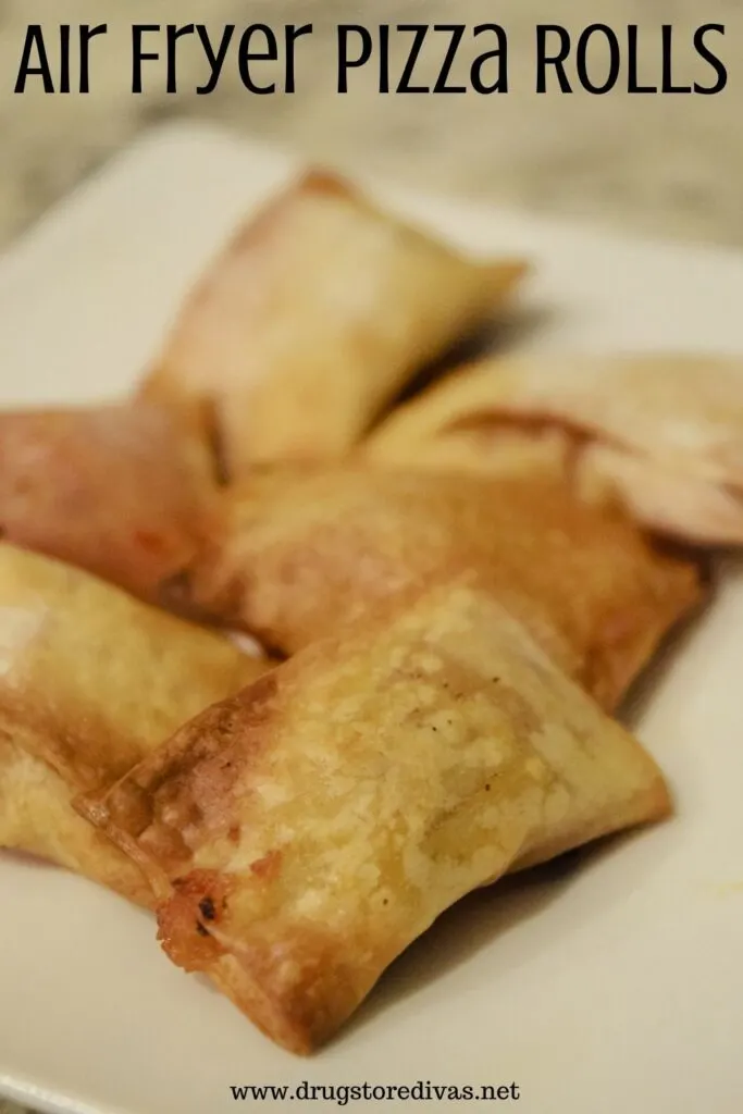 Homemade pizza rolls on a plate.