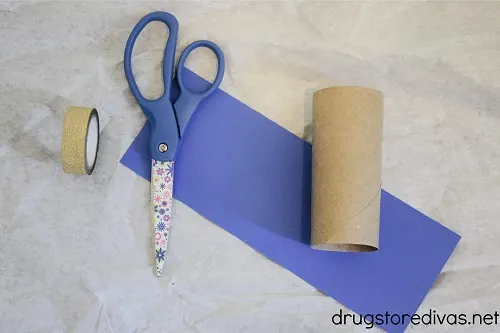 Support #WorldAutismDay by making this Autism Awareness Puzzle Piece Toilet Paper Bracelet Craft. Get the tutorial on www.drugstoredivas.net.