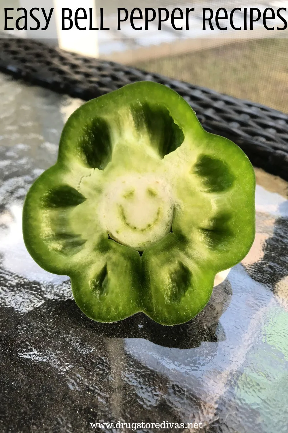 A cut green pepper on a table with the words 