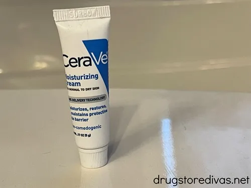 A trial sized bottle of CeraVe lotion.