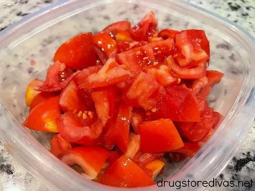This easy Garden Tomato Salad is the perfect way to use up tomatoes growing in your garden. It's the perfect summer side dish.