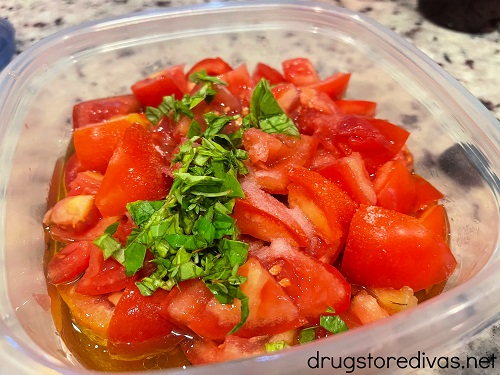 This easy Garden Tomato Salad is the perfect way to use up tomatoes growing in your garden. It's the perfect summer side dish.