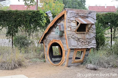 A wooden house in the children's garden area at the San Antonio Botanical Garden.