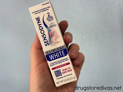A trial sized tube of Sensodyne toothpaste.