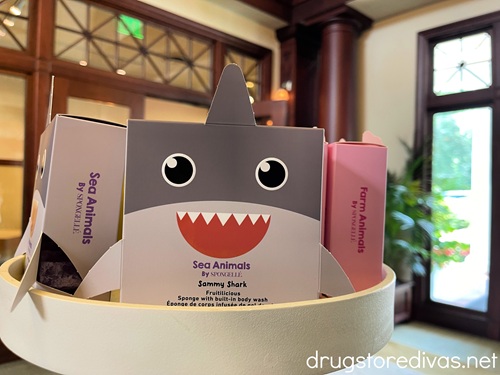 A box shaped like a shark in a display on a spa.