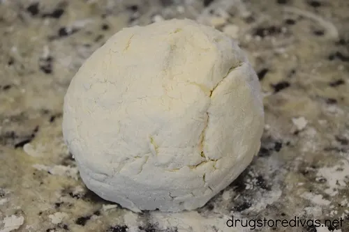 Two ingredient dough in a ball on the counter.