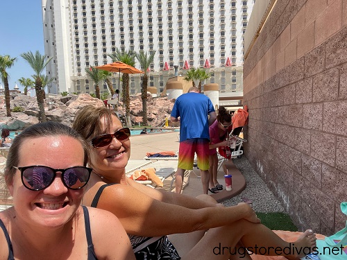 Two women sitting at the pool at Excalibur in Las Vegas.