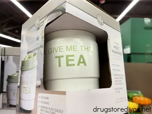 A wax warmer that says Give Me The Tea on it.
