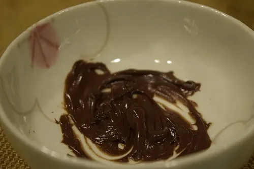 Melted chocolate chips in a bowl.
